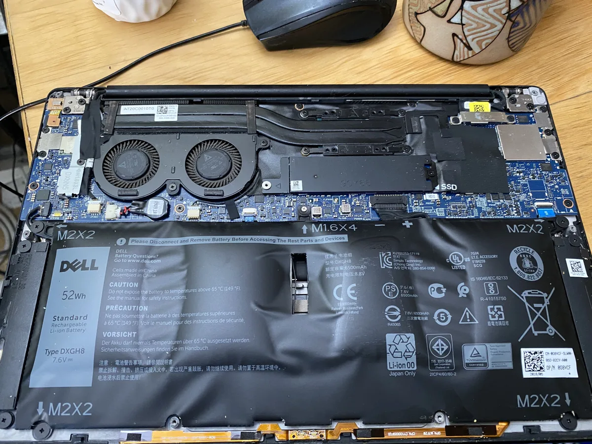Why Is My Laptop Battery Stuck at 60% or 80% Charge? 4 swollen laptop battery from degradation
