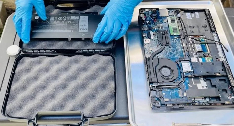 swollen laptop battery safe handling steps