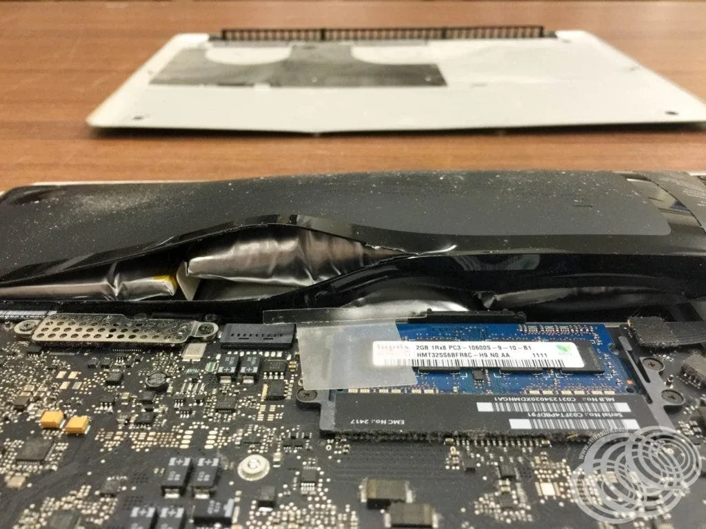 How to Fix Service Recommended Battery Message on MacBook 5 swollen MacBook battery safety hazard